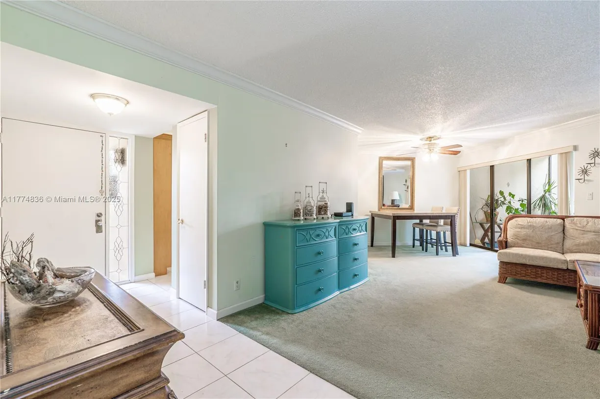 South Florida Real Estate | View 5750 Camino Del Sol, 103 | Listing