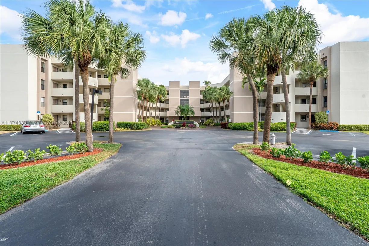 South Florida Real Estate | View 5750 Camino Del Sol, 103 | 2 Beds, 2 Baths
