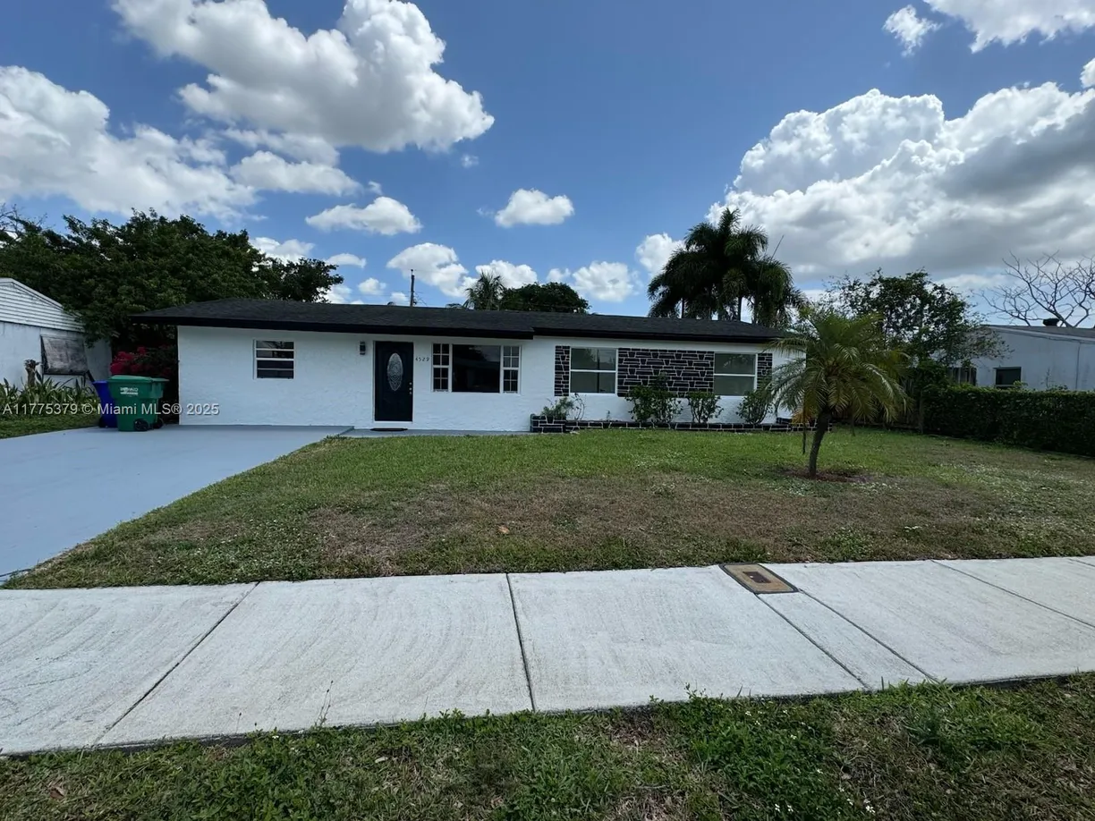 South Florida Real Estate | View 4529 SW 24th St | 3 Beds, 2 Baths