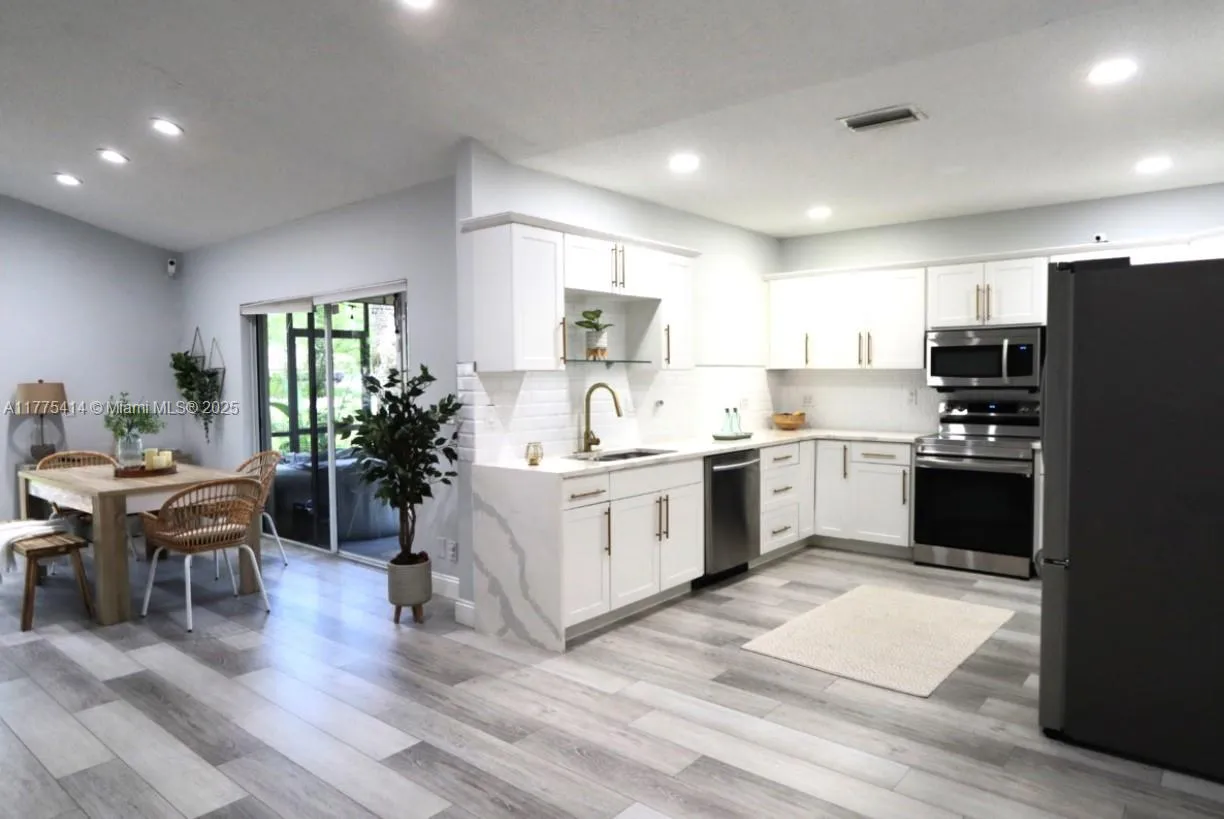 South Florida Real Estate | View 7601 Forest Green Ln | 3 Beds, 2 Baths