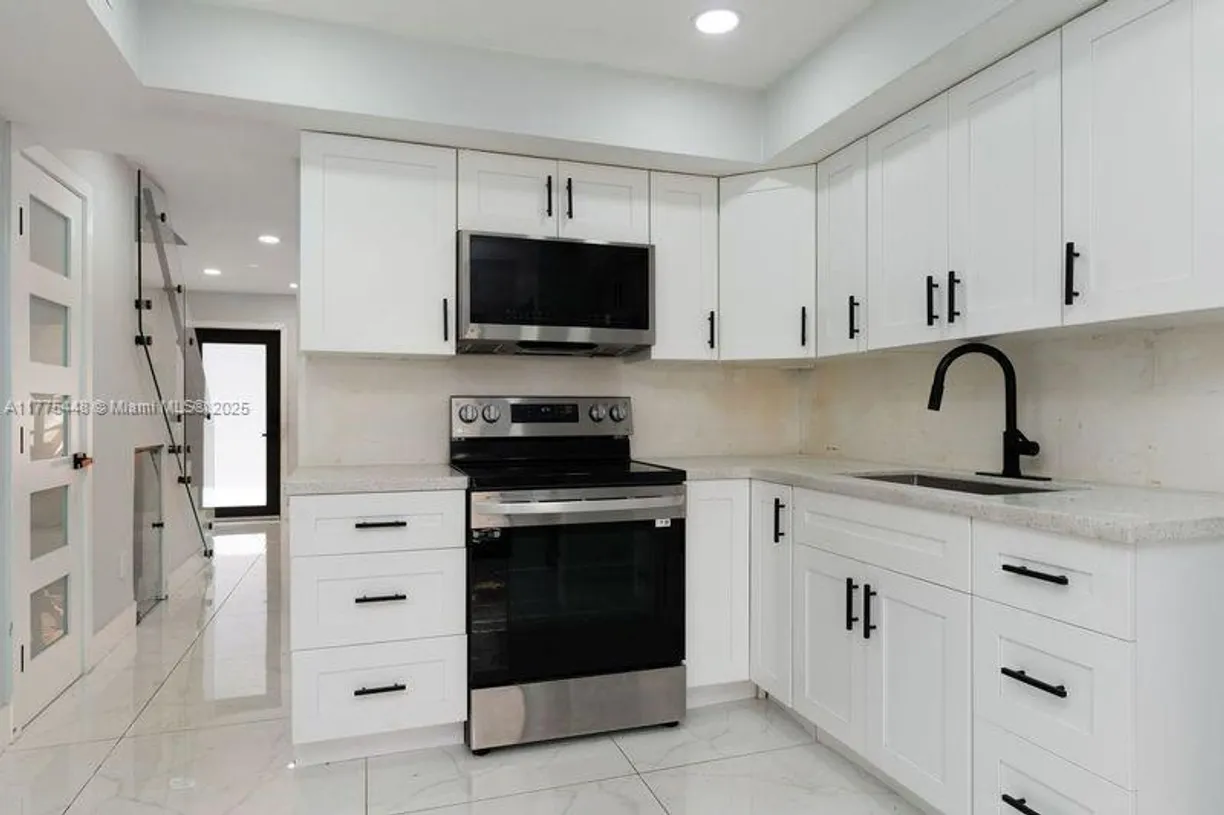 South Florida Real Estate | View 5431 W 22nd Ct, 107 | 2 Beds, 1 Bath