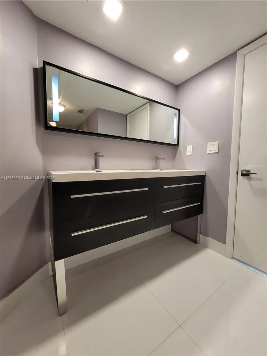 South Florida Real Estate | View 2861 N Oakland Forest Dr, 101 | Listing