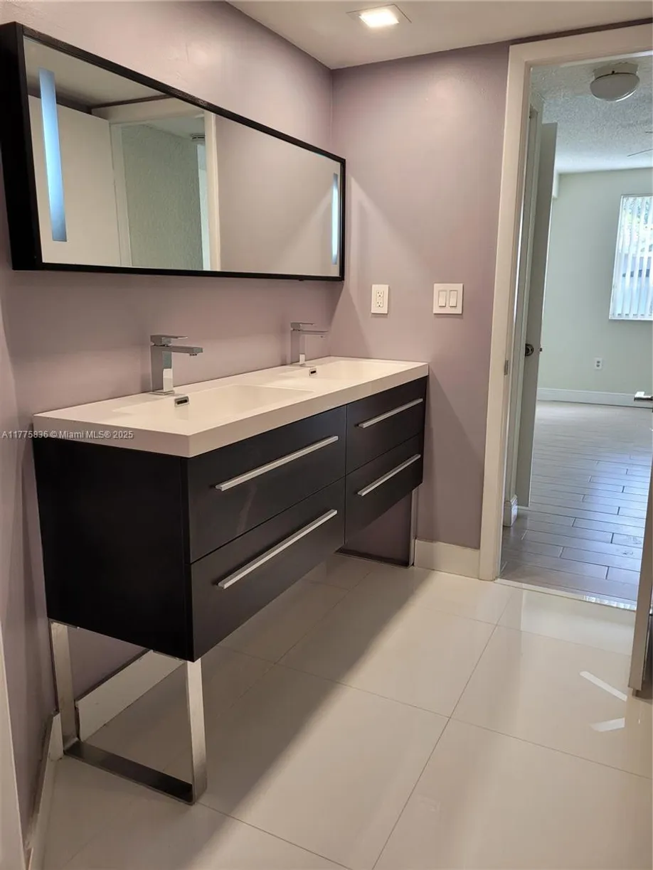 South Florida Real Estate | View 2861 N Oakland Forest Dr, 101 | Listing