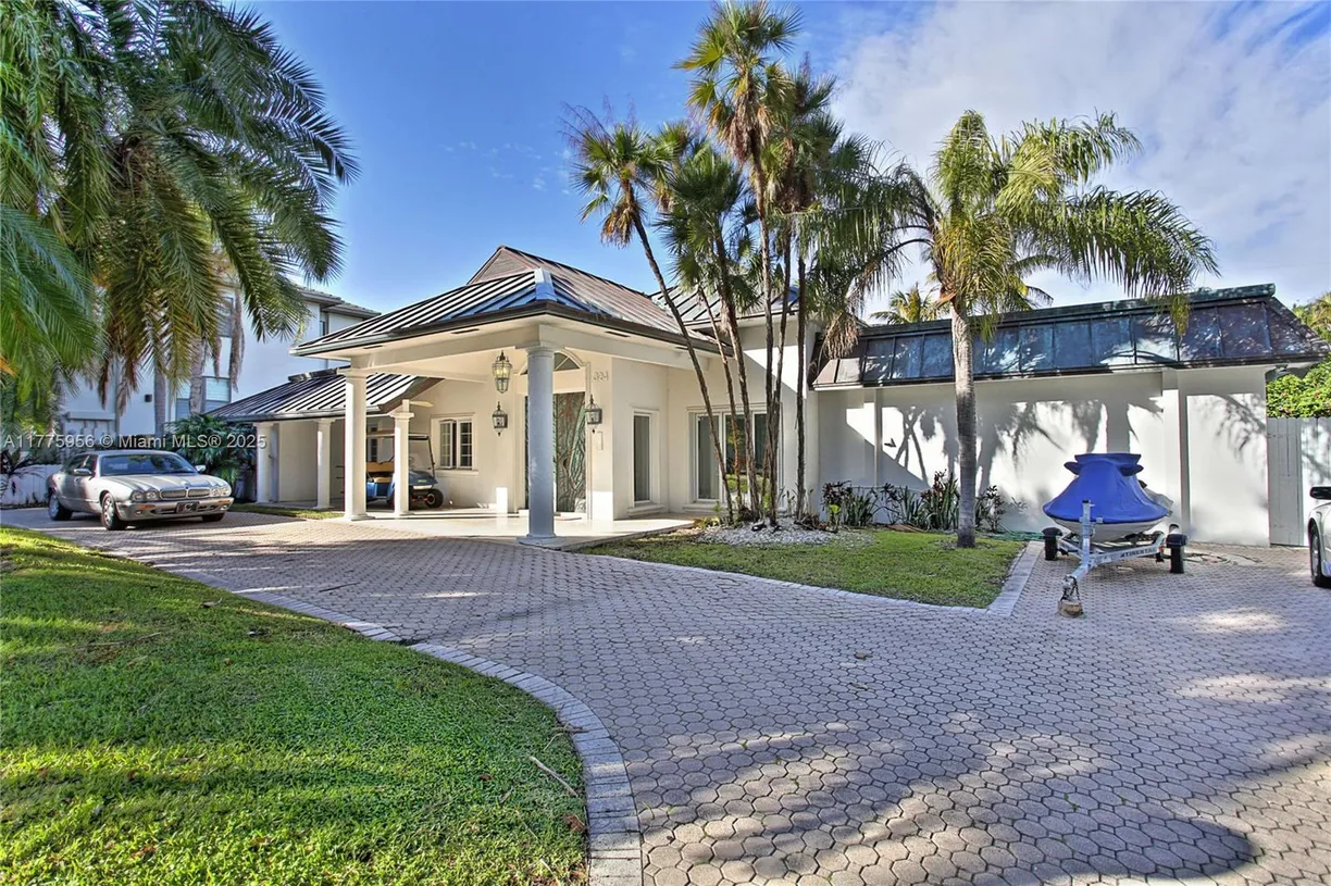 South Florida Real Estate | View 324 Caribbean Rd | 5 Beds, 4 Baths