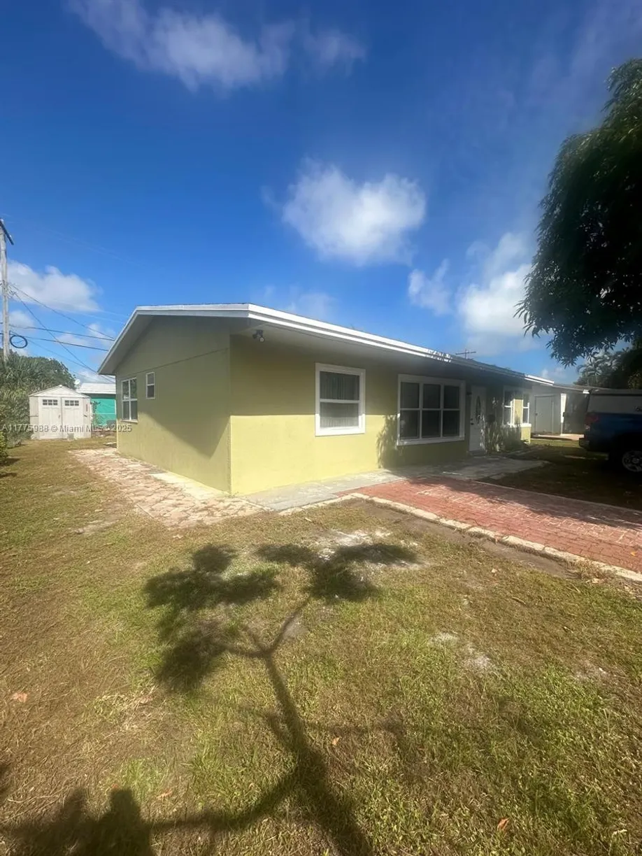 South Florida Real Estate | View 1611 NE 32nd Pl | 3 Beds, 2 Baths