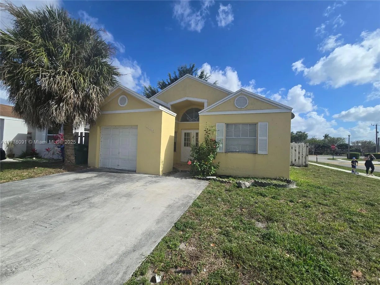 South Florida Real Estate | View 10040 Nandina St | 4 Beds, 2 Baths