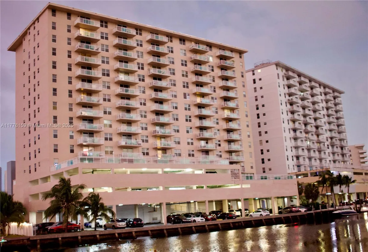 South Florida Real Estate | View 437 Golden Isles Dr, 9B-C | 4 Beds, 2 Baths