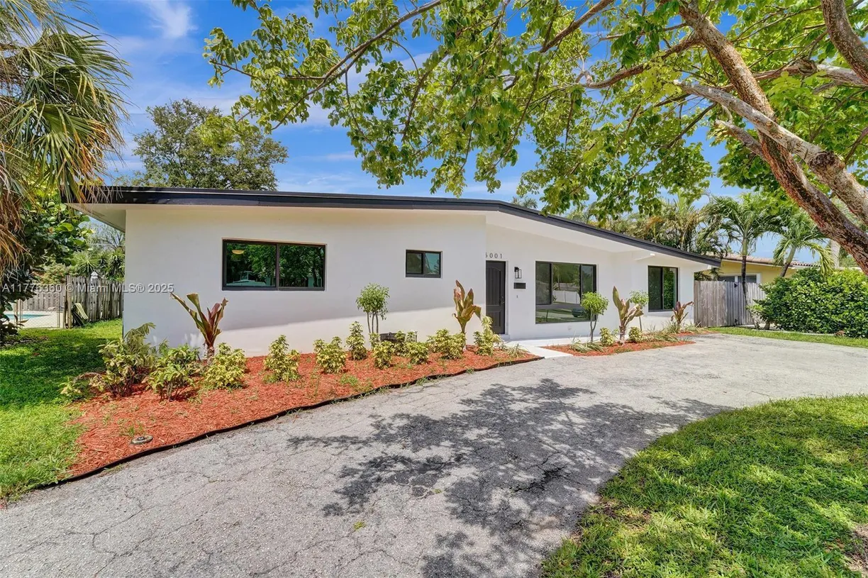 South Florida Real Estate | View 5001 NE 23rd Ave | 4 Beds, 3 Baths