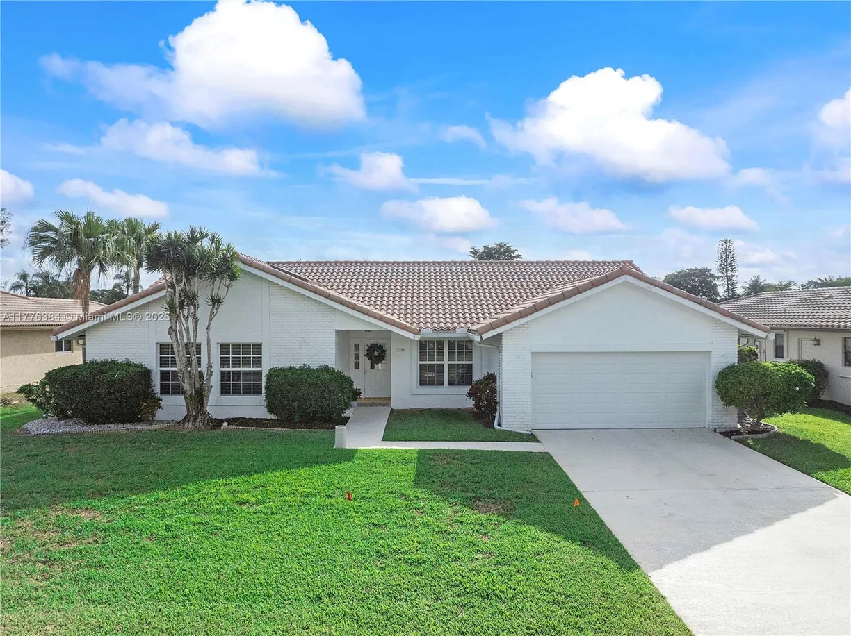 South Florida Real Estate | View 1999 NW 107th Dr | 4 Beds, 2 Baths