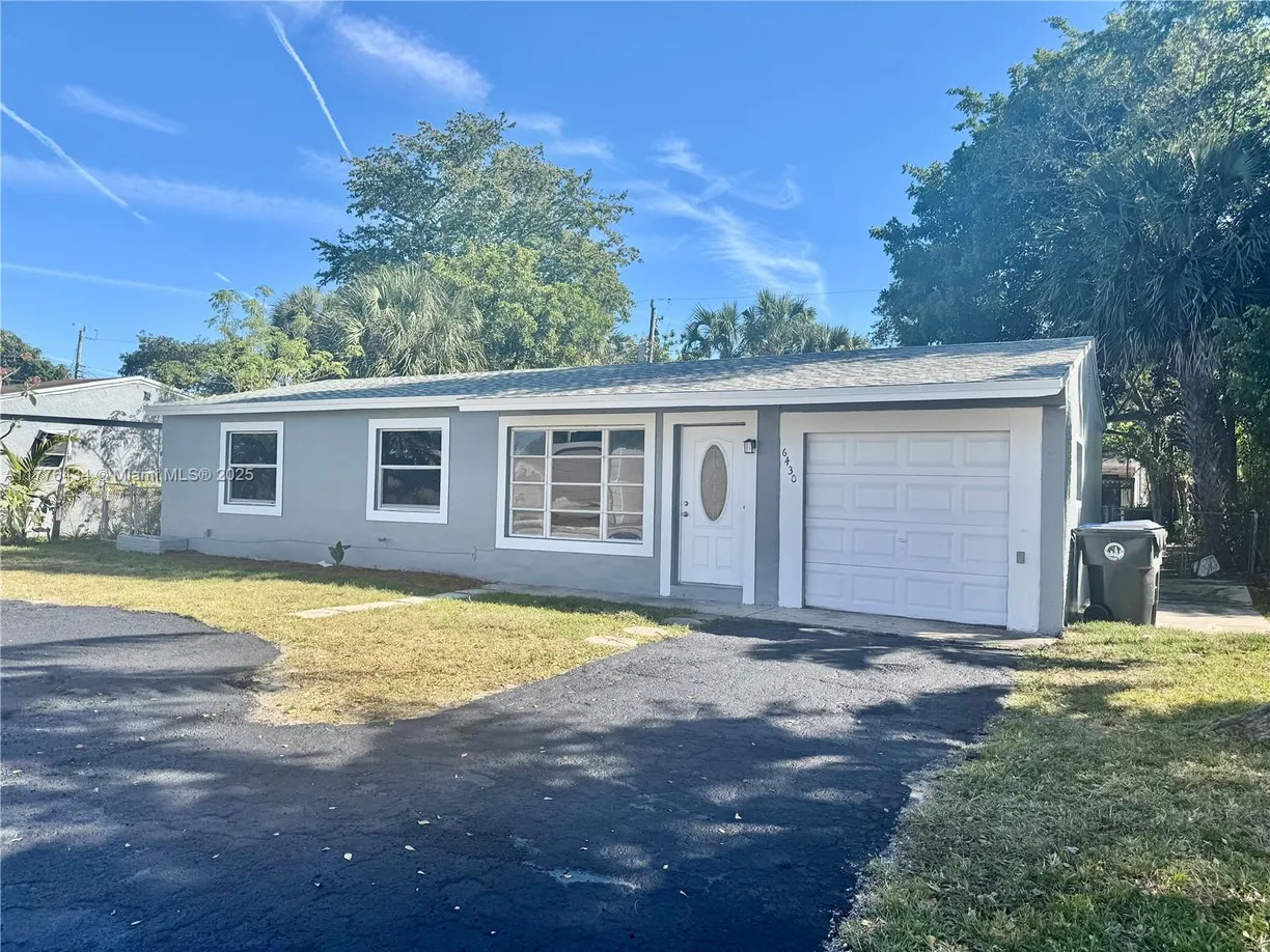 South Florida Real Estate | View 6430 SW 15th St | 3 Beds, 2 Baths