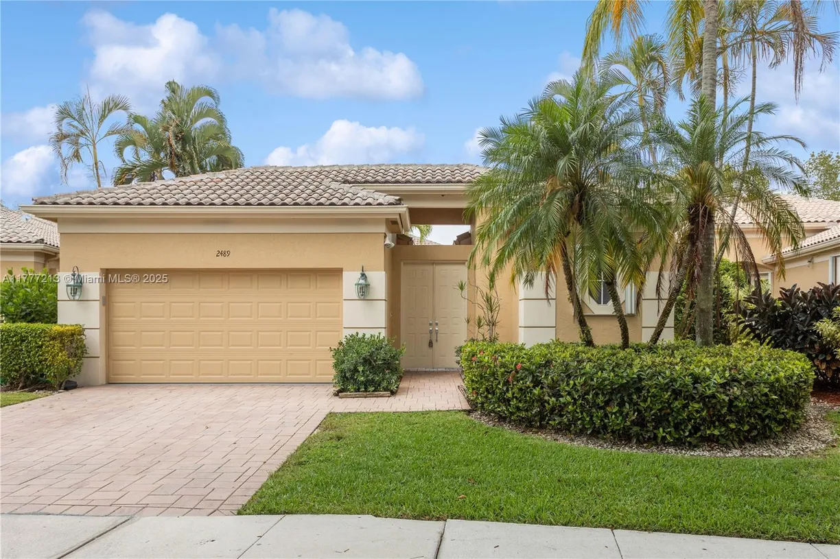 South Florida Real Estate | View 2489 Bay Isle Dr | 4 Beds, 3 Baths