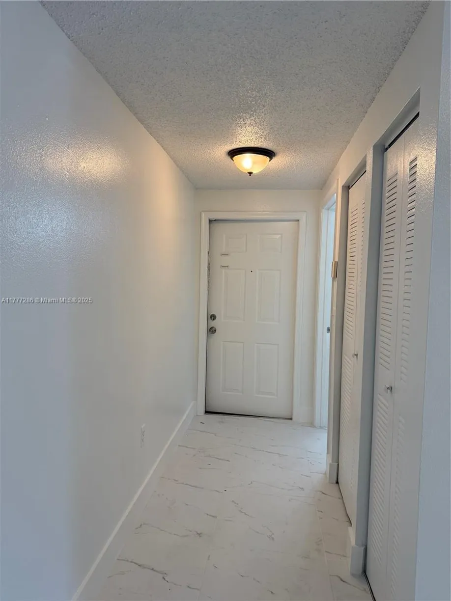 South Florida Real Estate | View 3221 Sabal Palm Mnr, 105 | Listing