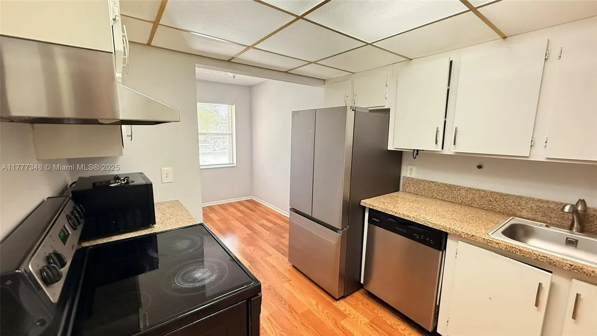 South Florida Real Estate | View 5987 Forest Hill Blvd, 205 | 2 Beds, 2 Baths