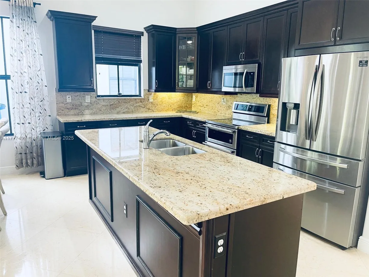 South Florida Real Estate | View 2735 NW 84th Ter | 4 Beds, 3 Baths