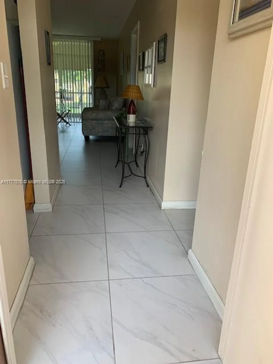 South Florida Real Estate | View 6021 NW 61st Ave, 208 | Listing