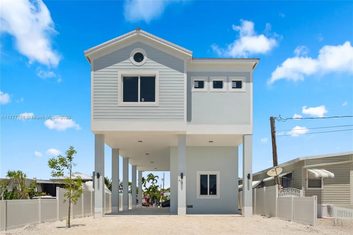 South Florida Real Estate | View 413 Bowie Ln | 4 Beds, 3 Baths