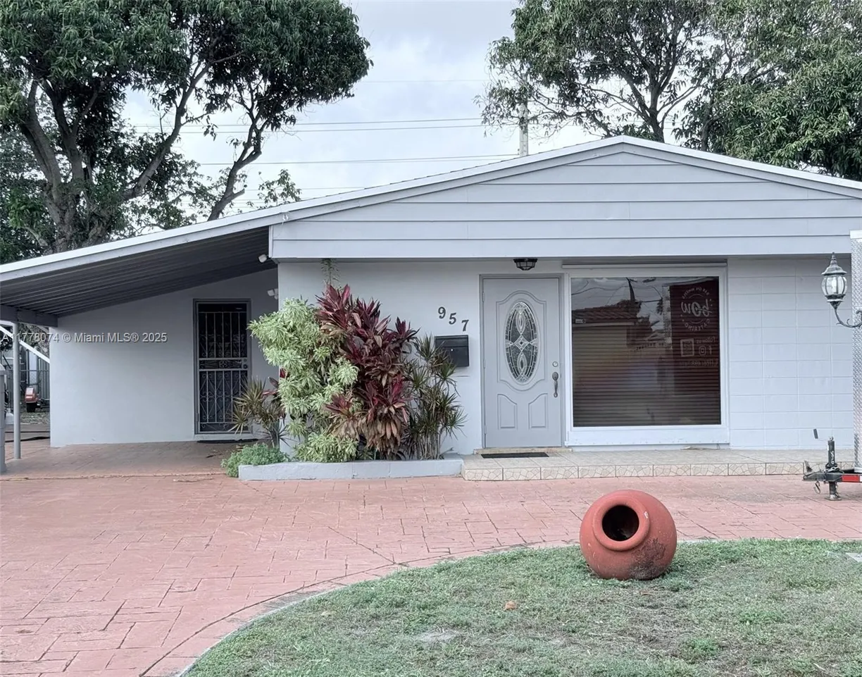 South Florida Real Estate | View 957 W 67th St | 4 Beds, 2 Baths