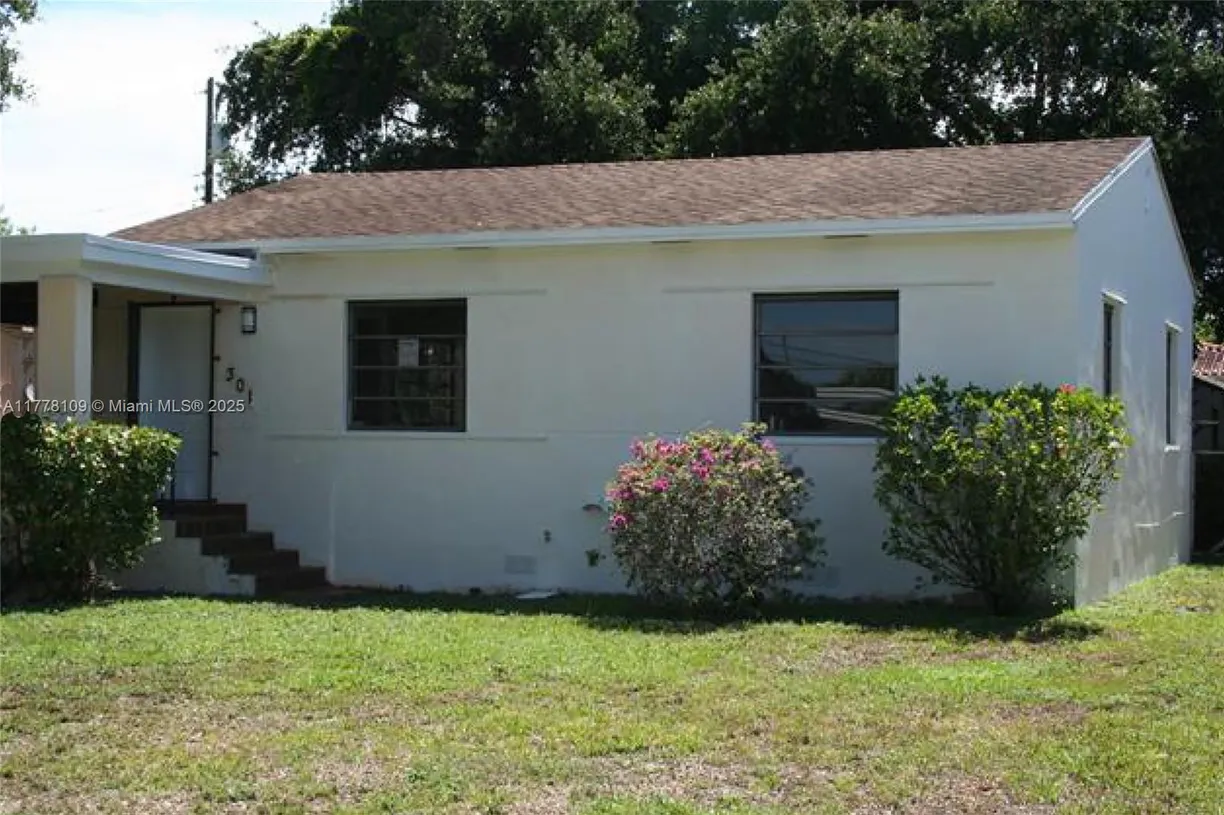 South Florida Real Estate | View 301 SW 51st Ave | 2 Beds, 1 Bath