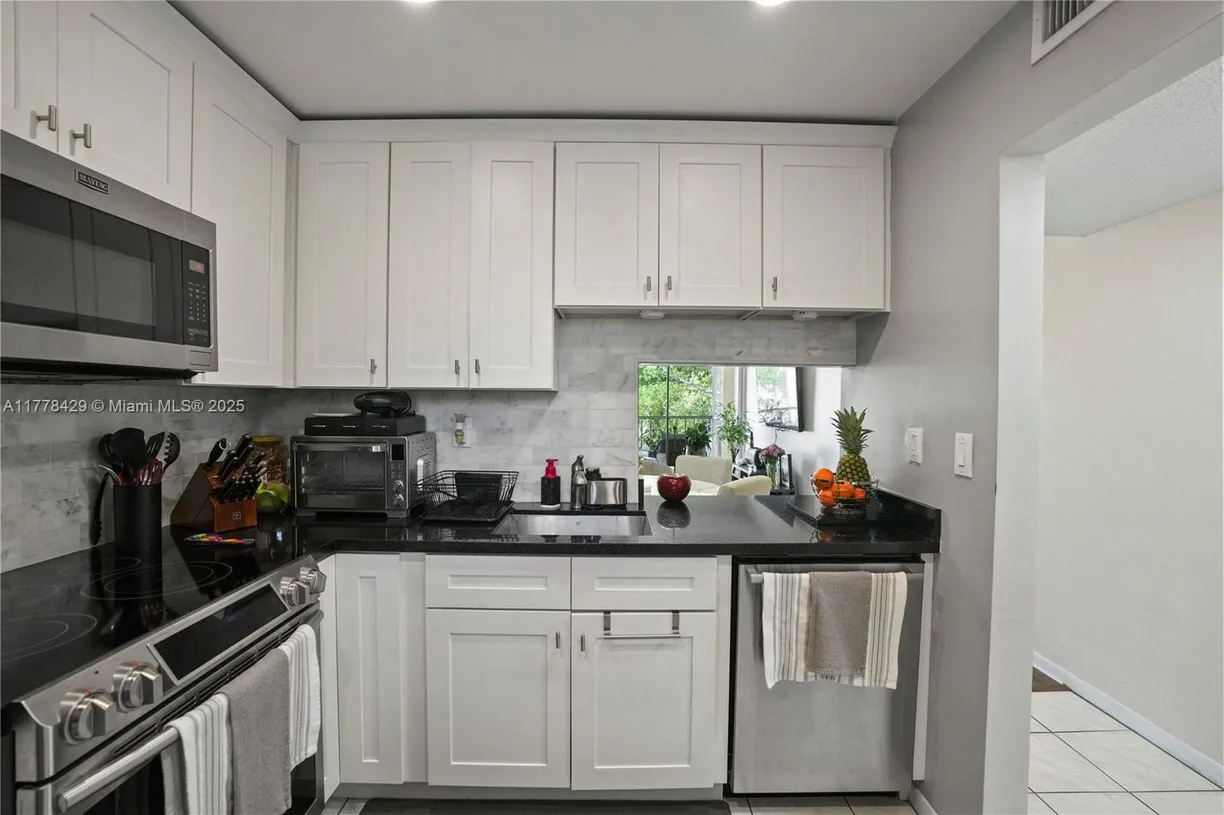 South Florida Real Estate | View 471 N Pine Island Rd, D405 | Listing