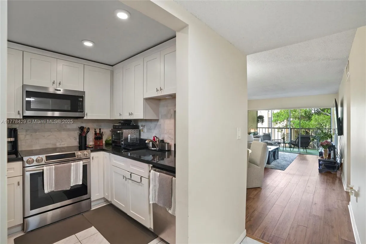 South Florida Real Estate | View 471 N Pine Island Rd, D405 | Listing