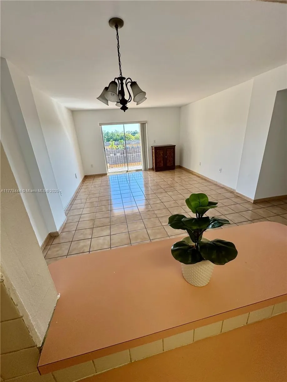South Florida Real Estate | View 1075 W 68th St, 314 | 3 Beds, 2 Baths
