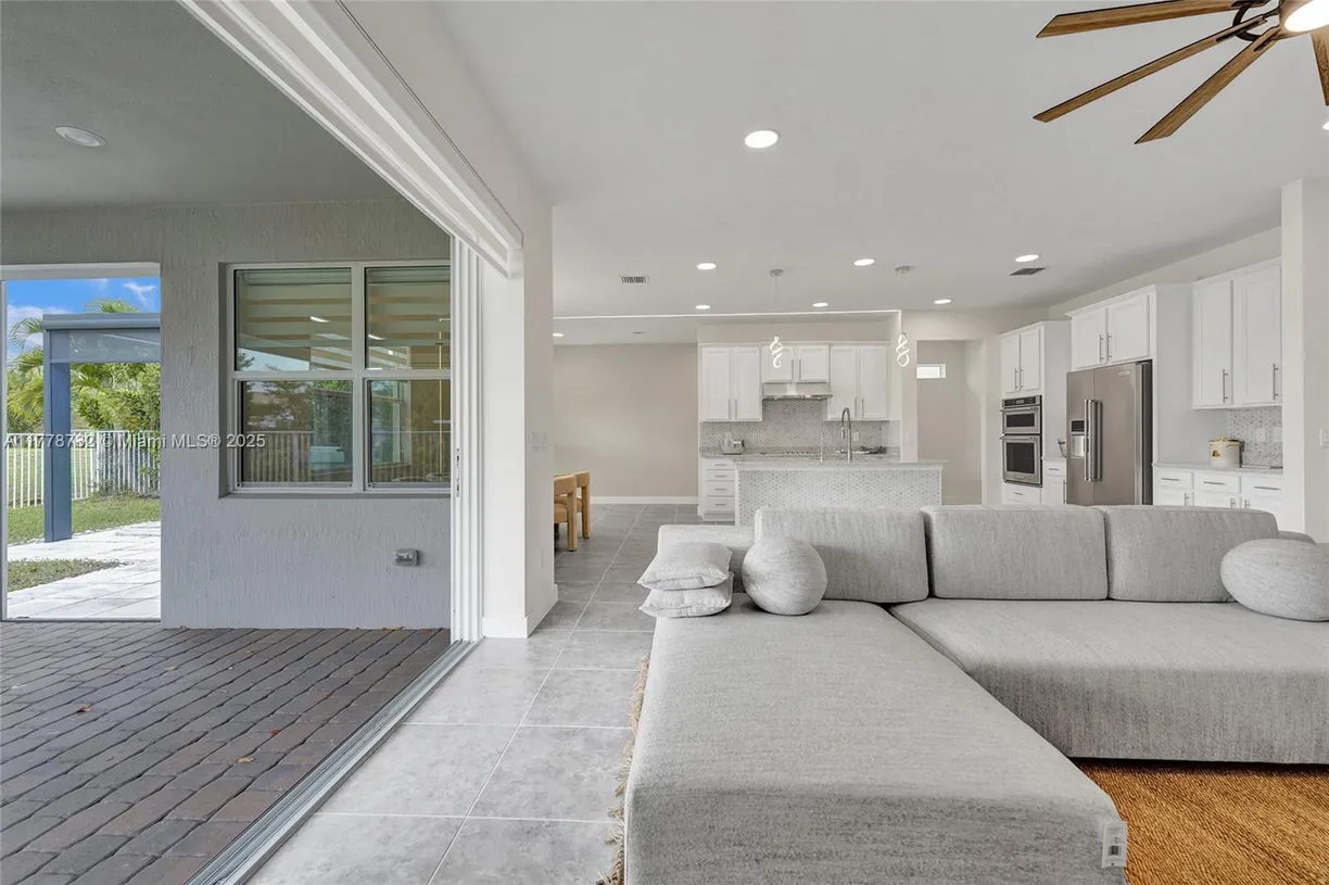 South Florida Real Estate | View 1348 Silk Oak Dr | 5 Beds, 3 Baths
