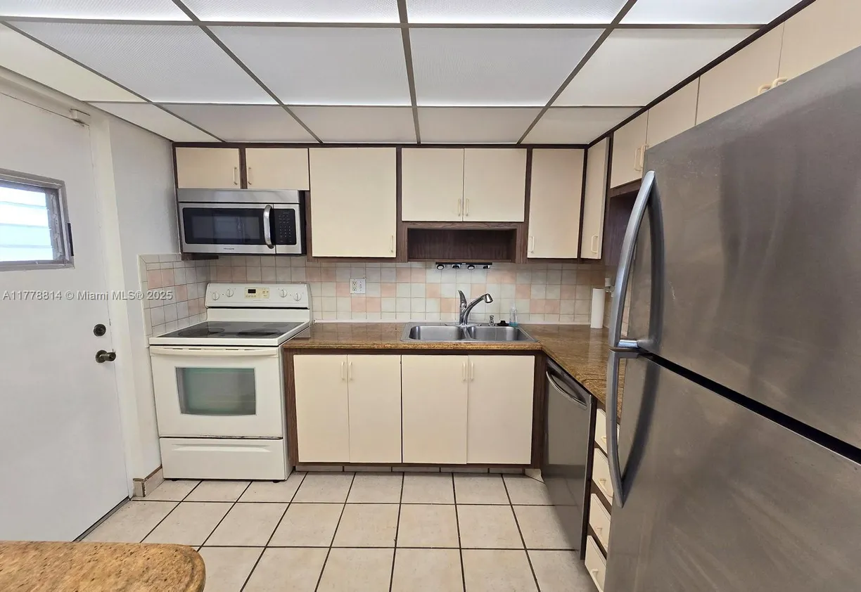 South Florida Real Estate | View 2313 S Cypress Bend Dr, 123A | Listing