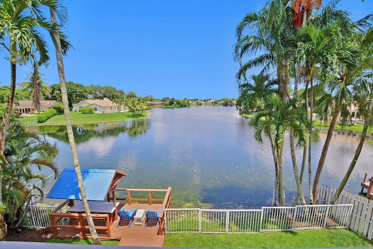 South Florida Real Estate | View 11565 N Quayside Dr | 4 Beds, 2 Baths