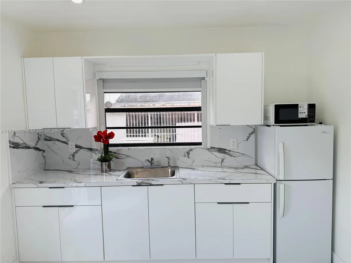 South Florida Real Estate | View 706 W 40th Pl, Efficiency | 1 Bed, 1 Bath