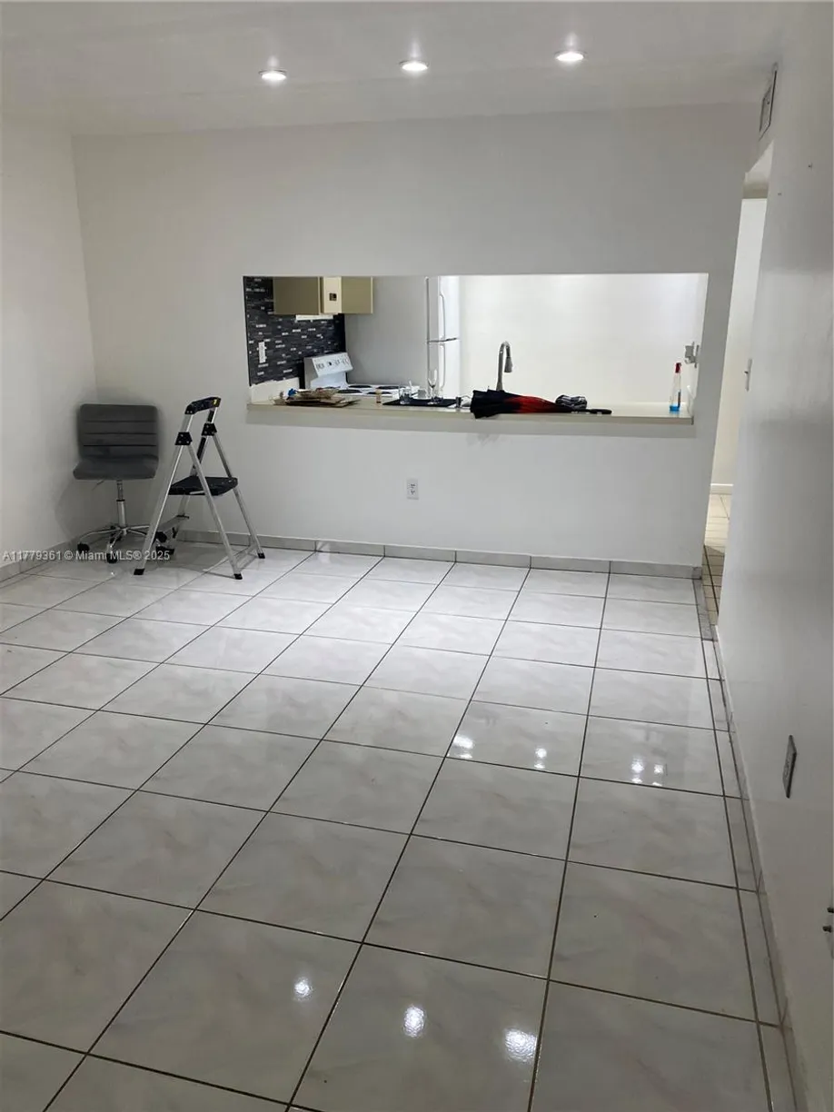 South Florida Real Estate | View 2720 W 63rd Pl, 203 | Listing
