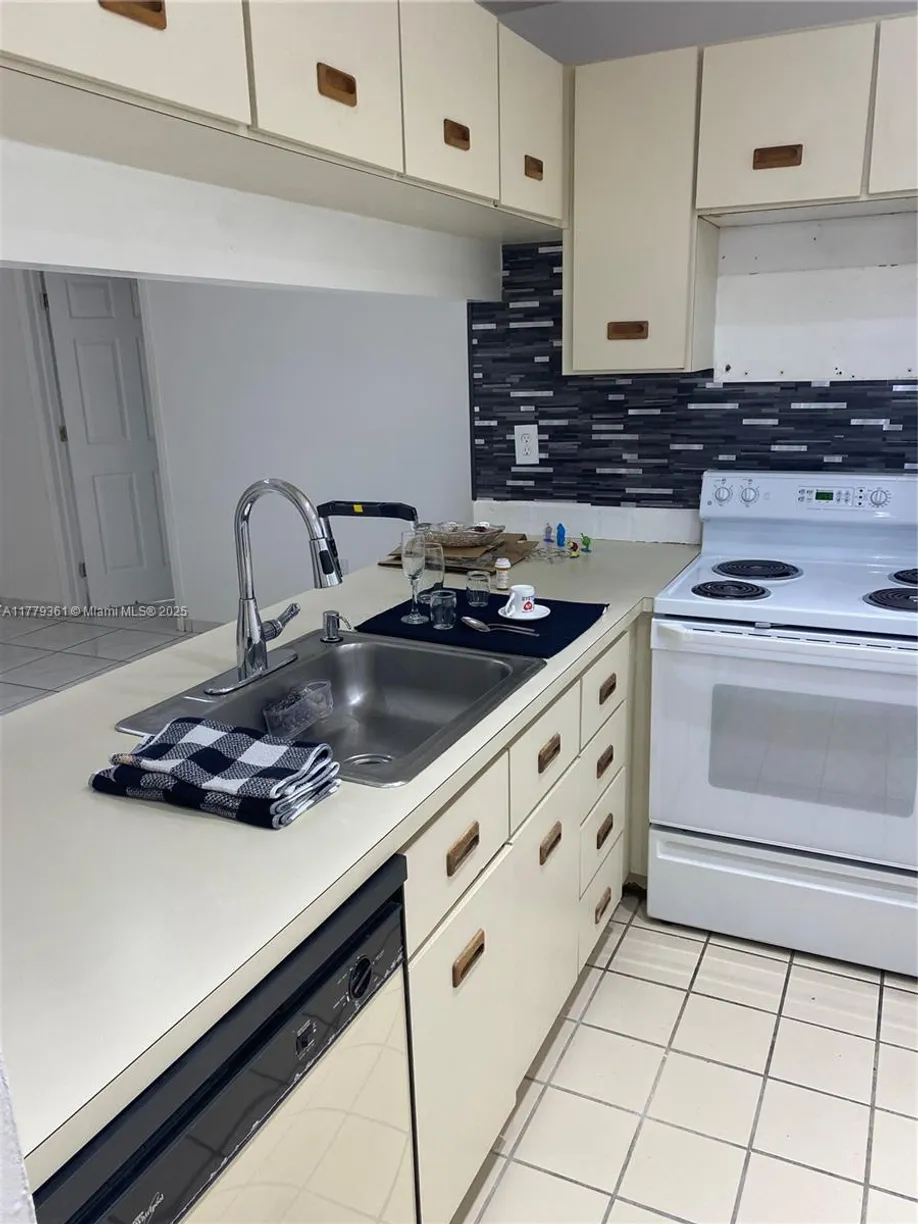 South Florida Real Estate | View 2720 W 63rd Pl, 203 | 2 Beds, 2 Baths