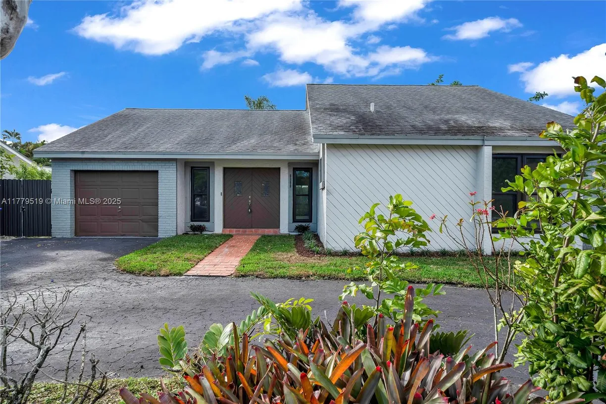 South Florida Real Estate | View 8380 NW 7th Street | 3 Beds, 2 Baths