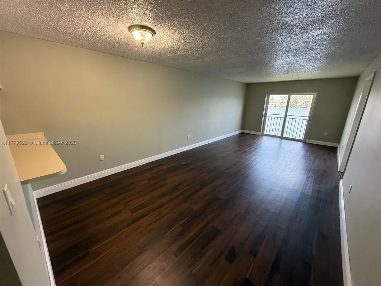 South Florida Real Estate | View 9917 W Okeechobee Rd, 3-309 | 2 Beds, 2 Baths