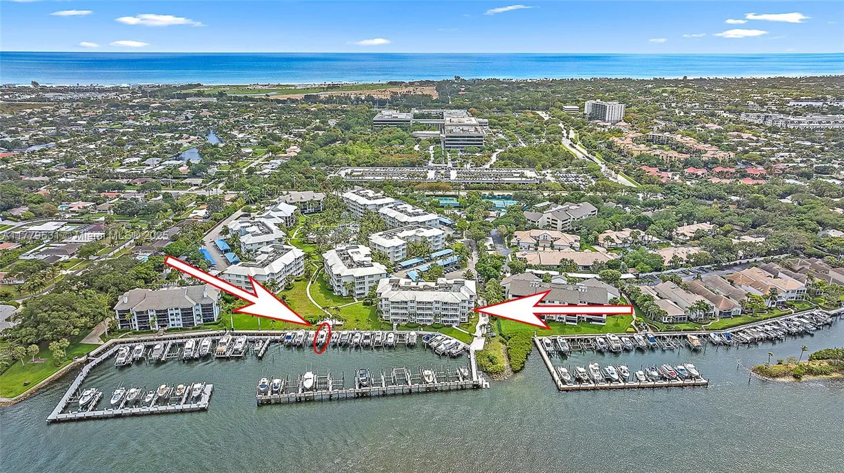 South Florida Real Estate | View 621 Bay Colony Dr S, & Slip 13 | 3 Beds, 2 Baths