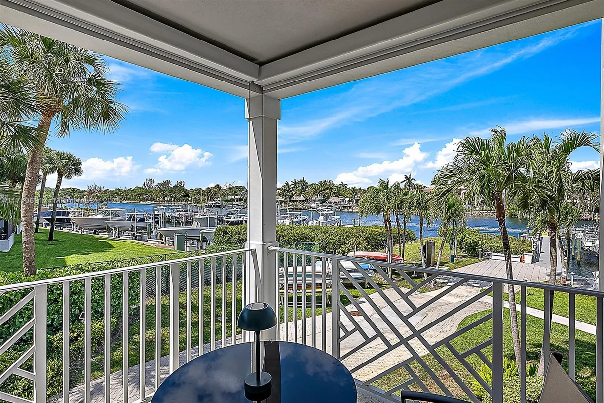 South Florida Real Estate | View 621 S Bay Colony Dr S, & Slip 13 | 3 Beds, 2 Baths