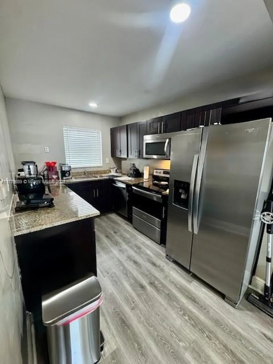 South Florida Real Estate | View 305 W 68th St, 217 | 3 Beds, 2 Baths