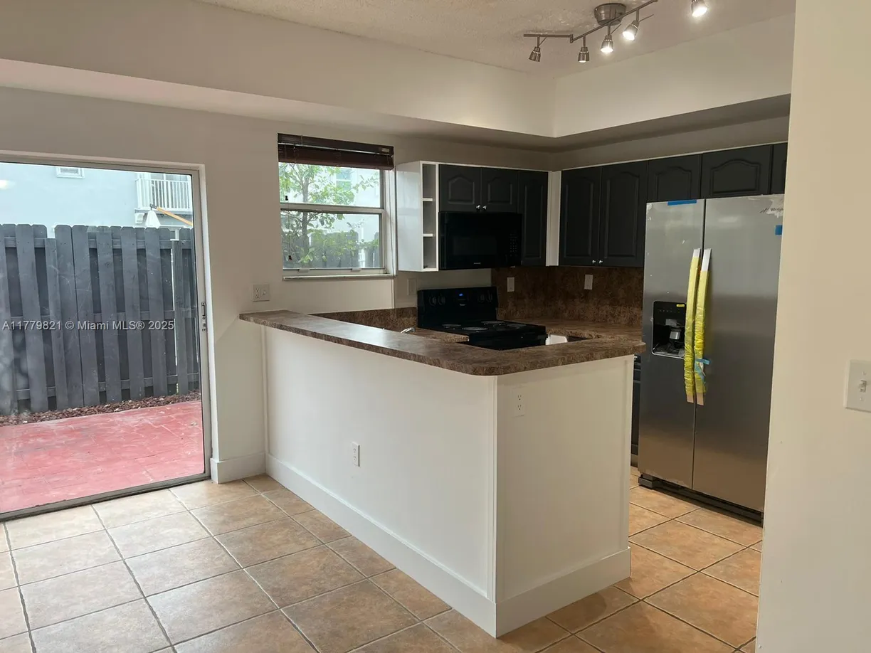 South Florida Real Estate | View 5240 NW 109th Ave, 4 | 3 Beds, 2 Baths
