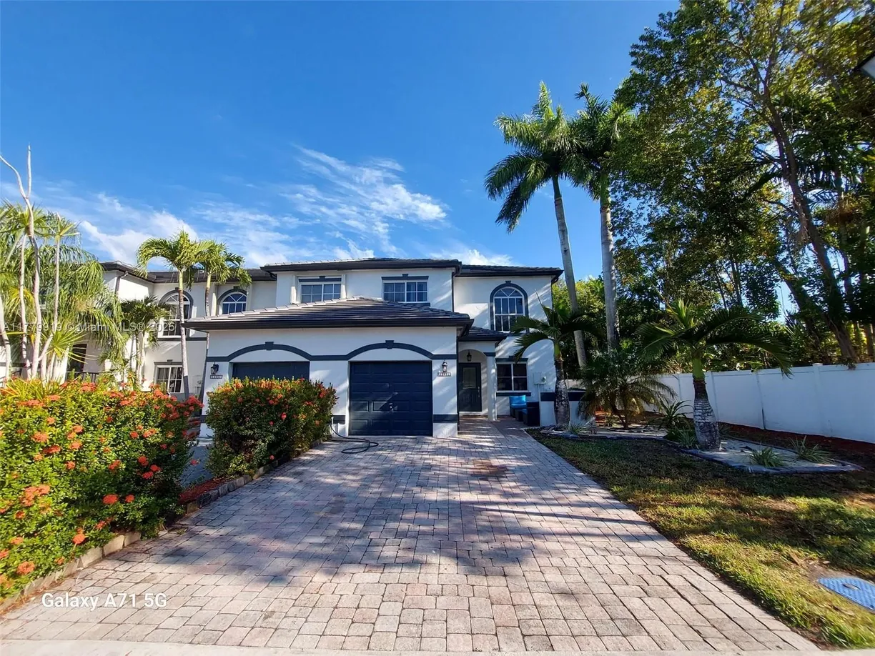 South Florida Real Estate | View 12851 SW 49th Ct | 3 Beds, 3 Baths