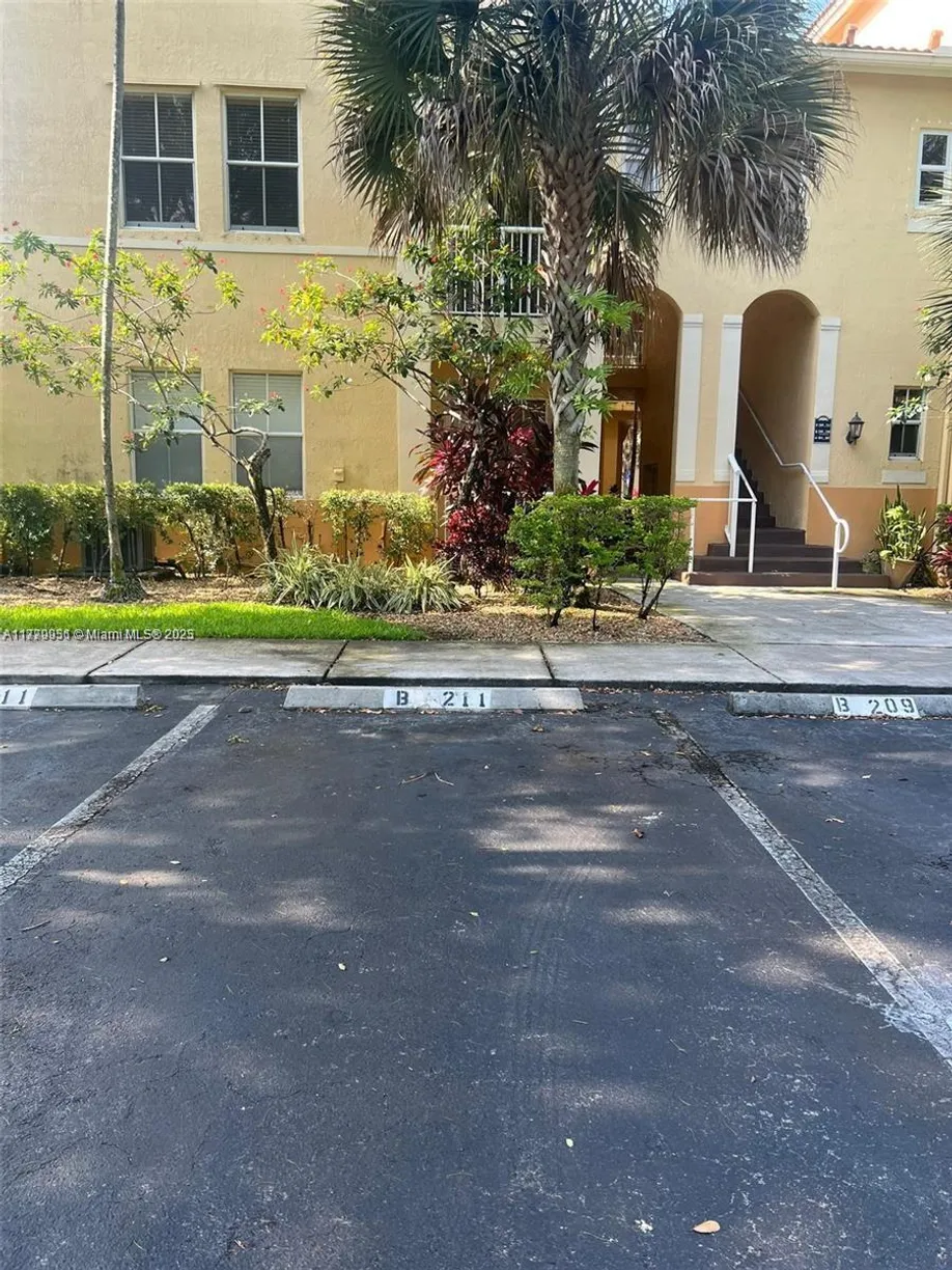 South Florida Real Estate | View 110 Jacaranda Country Club Dr, 211 | Listing