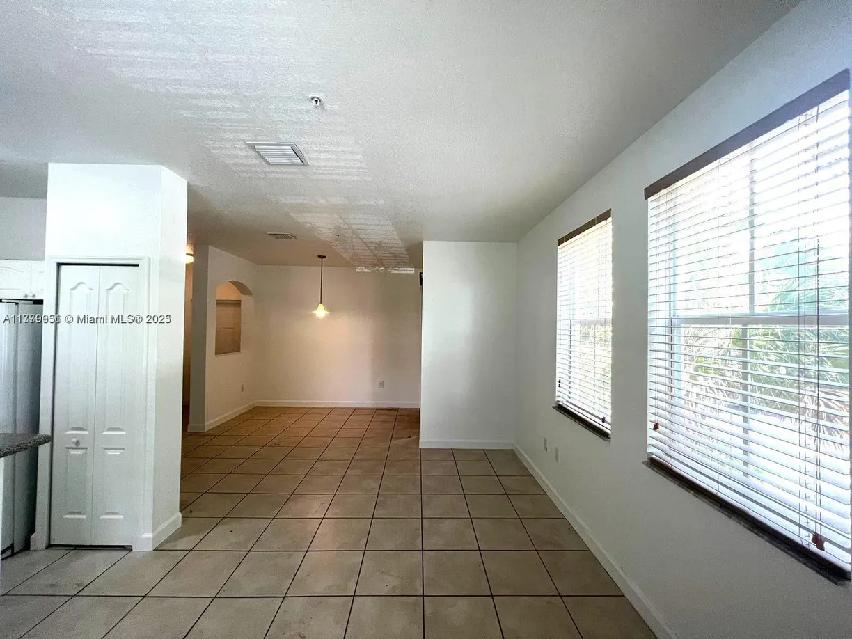 South Florida Real Estate | View 110 Jacaranda Country Club Dr, 211 | Listing