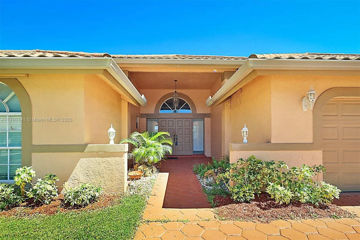 South Florida Real Estate | View 9677 N Springs Way | Listing