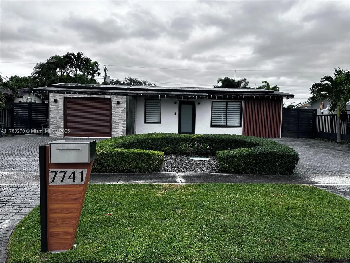 South Florida Real Estate | View 7741 NW 31st St | 3 Beds, 2 Baths