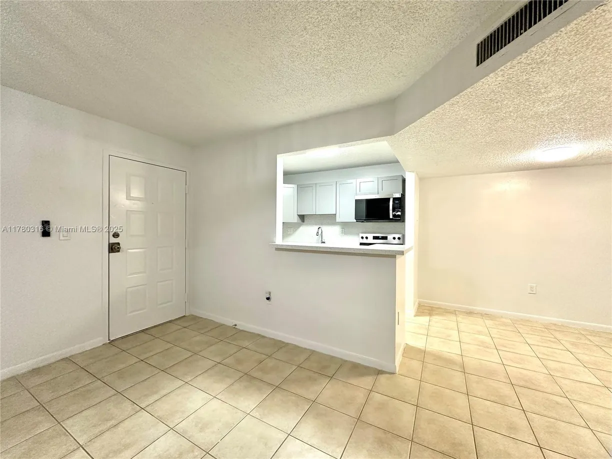 South Florida Real Estate | View 7215 NW 179th St, 206 | Listing