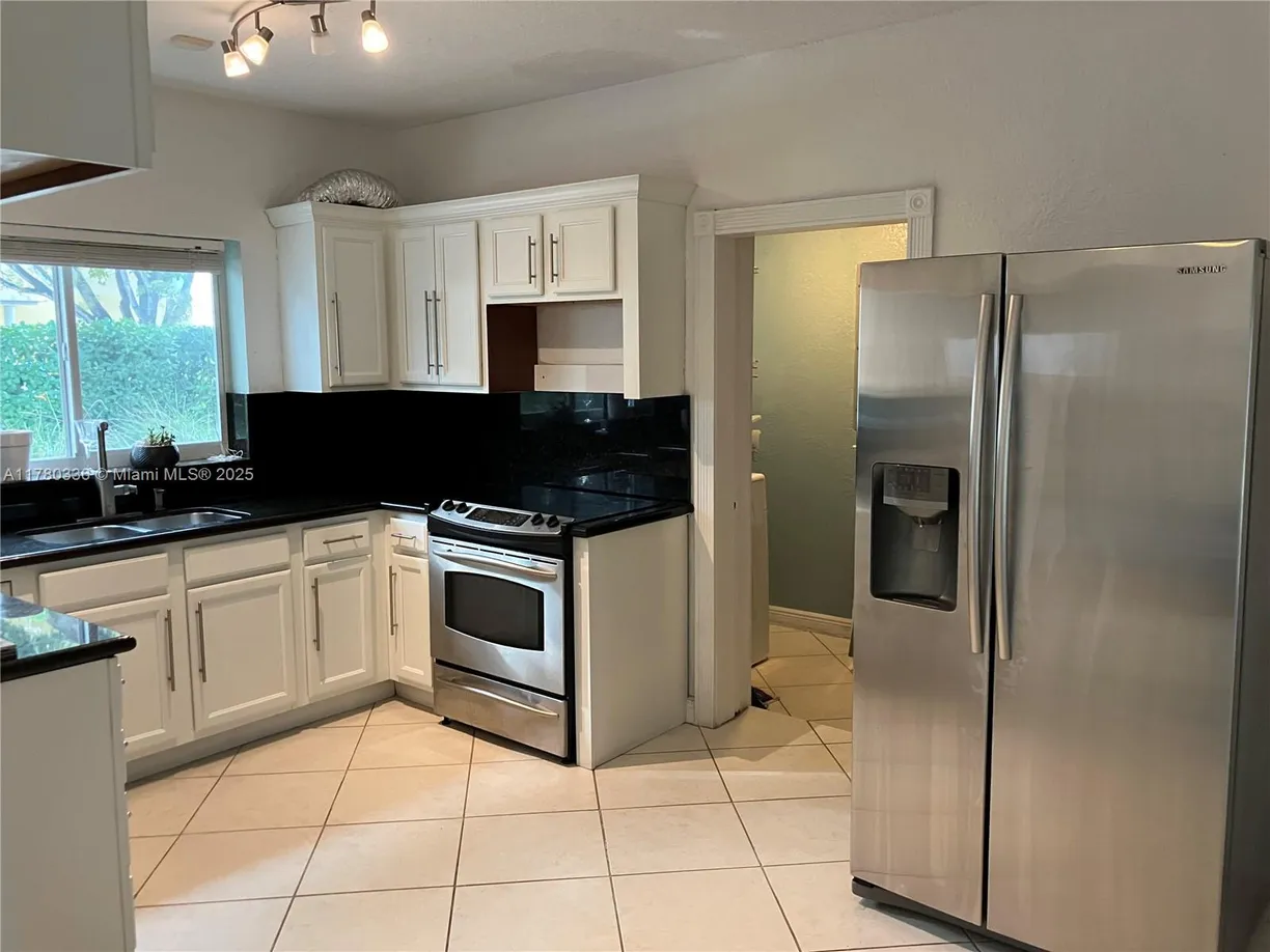 South Florida Real Estate | View 5495 SW 68th Ave | 4 Beds, 2 Baths