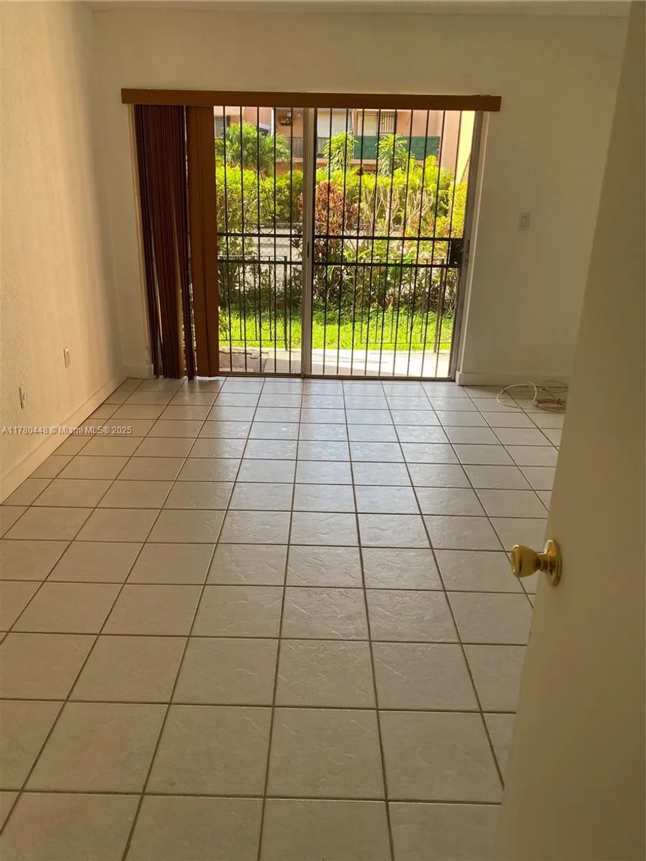South Florida Real Estate | View 1300 W 47th Pl, 118 | Listing