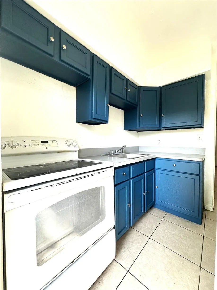 South Florida Real Estate | View 146 NW 40th Ct, 1 | 2 Beds, 1 Bath