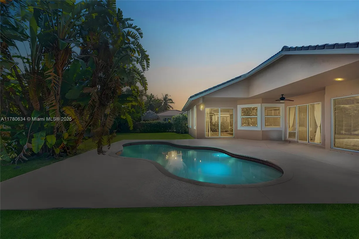 South Florida Real Estate | View 11257 NW 51st St | 4 Beds, 2 Baths