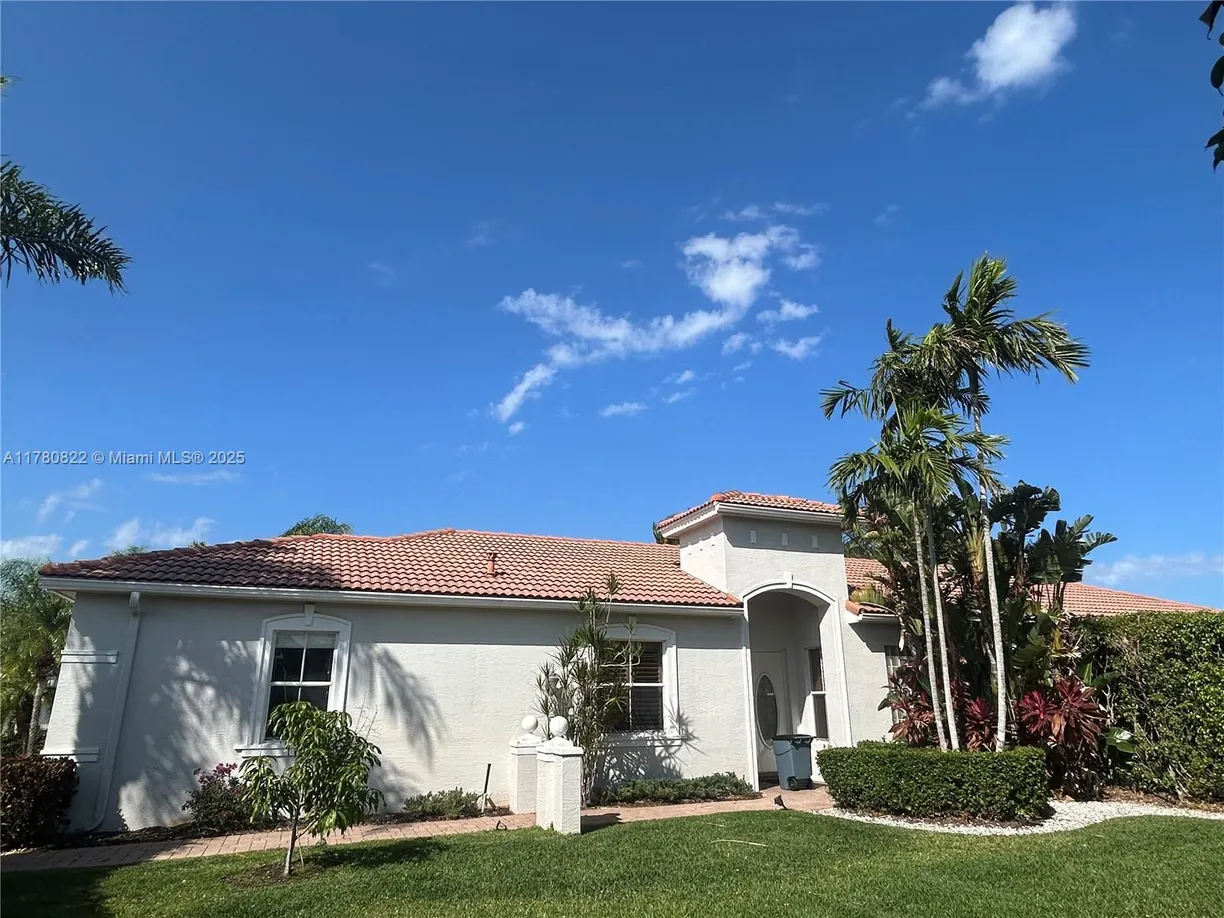 South Florida Real Estate | View 240 Isle Verde Way | 3 Beds, 2 Baths