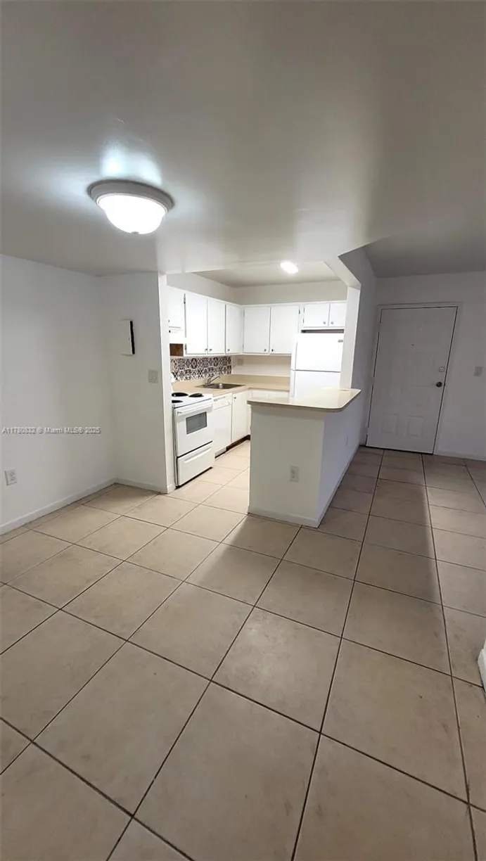 South Florida Real Estate | View 7100 NW 179th St, 209 | 1 Bed, 1 Bath