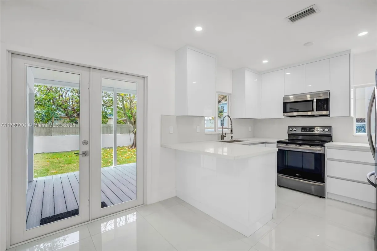 South Florida Real Estate | View 4112 SW 9th Ter | 3 Beds, 3 Baths